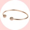 Bracciale bangle con due boules